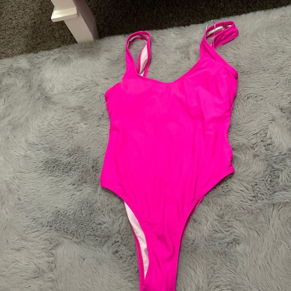 A one piece bathing suit hot pink and size small